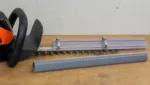 Abdeck- und Schutzblenden als DIY-Konzept fuer Heckenschere: Gefahren reduzieren