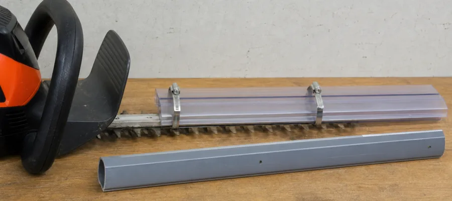 Abdeck- und Schutzblenden als DIY-Konzept fuer Heckenschere: Gefahren reduzieren